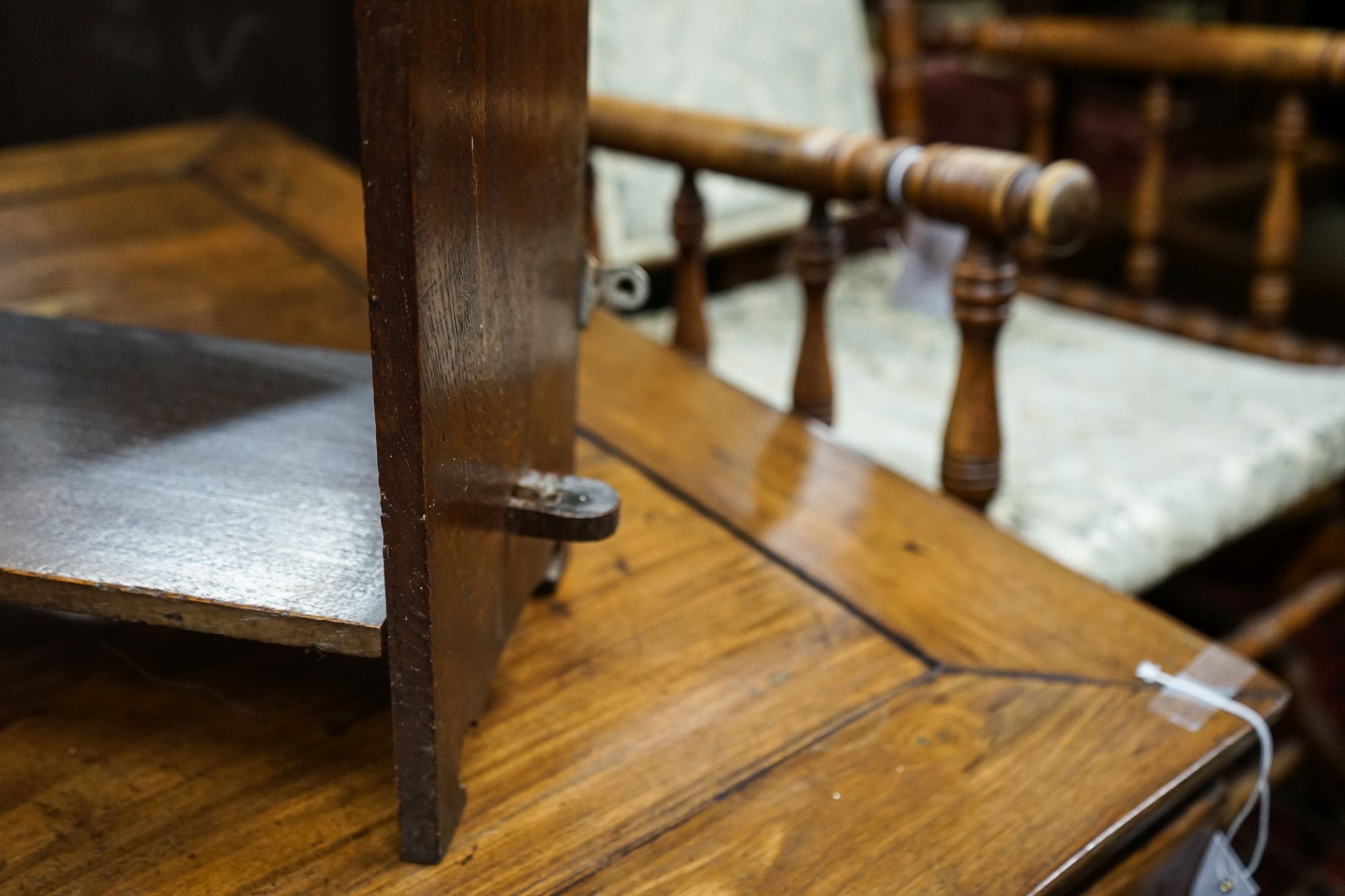 A late Victorian oak wall bracket, caned stool and chair